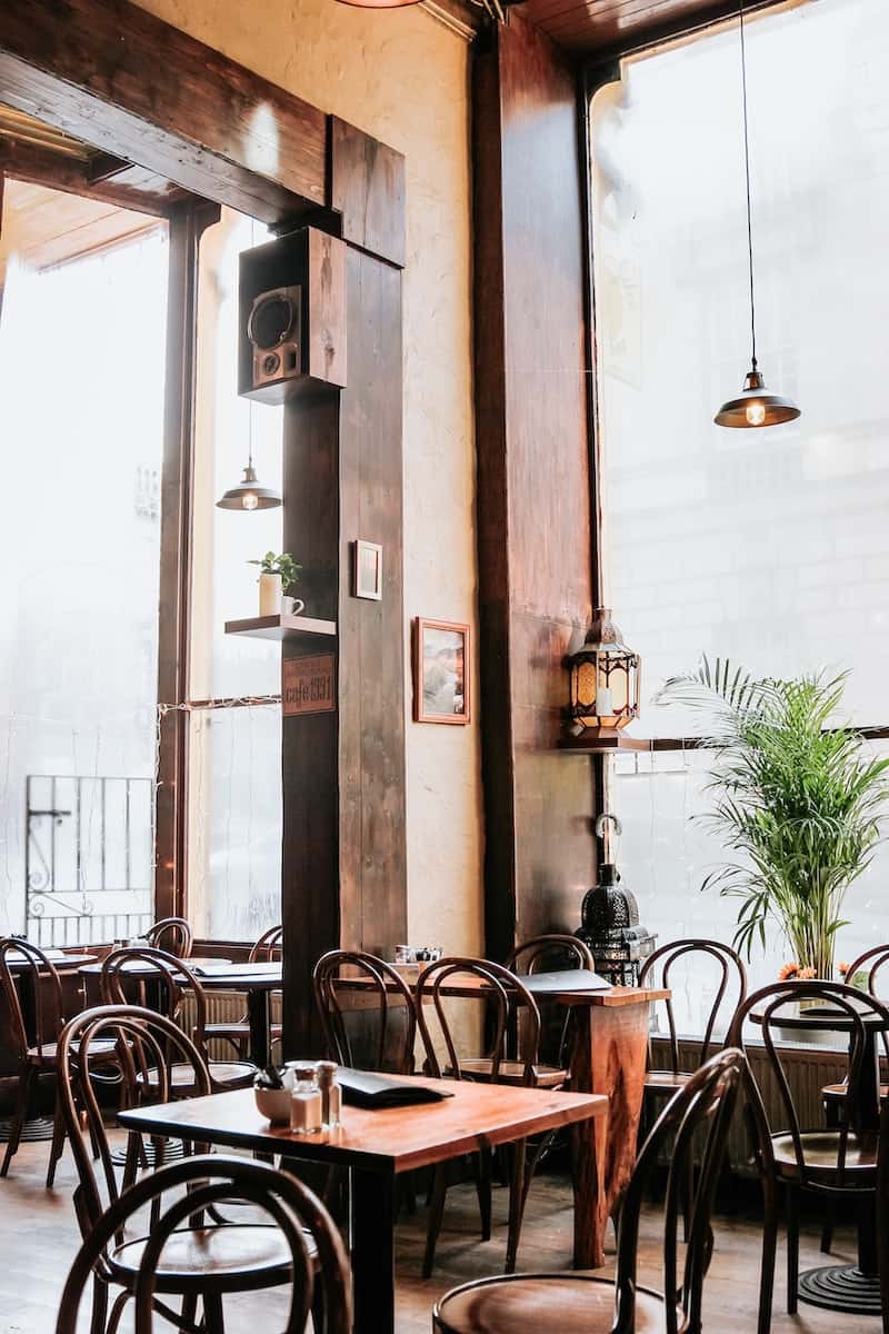wooden tables and chairs in a cafe or restaurant